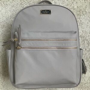 Kate Spade Wilson Road Bradley gray backpack with gold